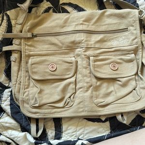 Fox racing girls messenger bag, one size, tan with floral inside.